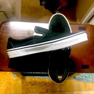 Black slip on vans.  Men’s size 11